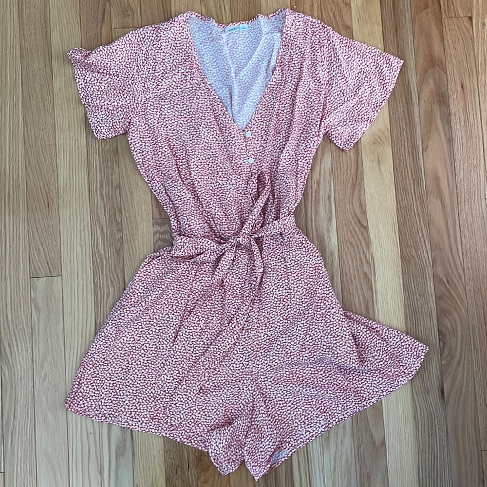 Pink patterned romper from Gap.